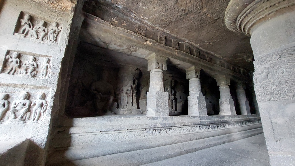 Pillars, carvings and shrines in one of the Ellora temple