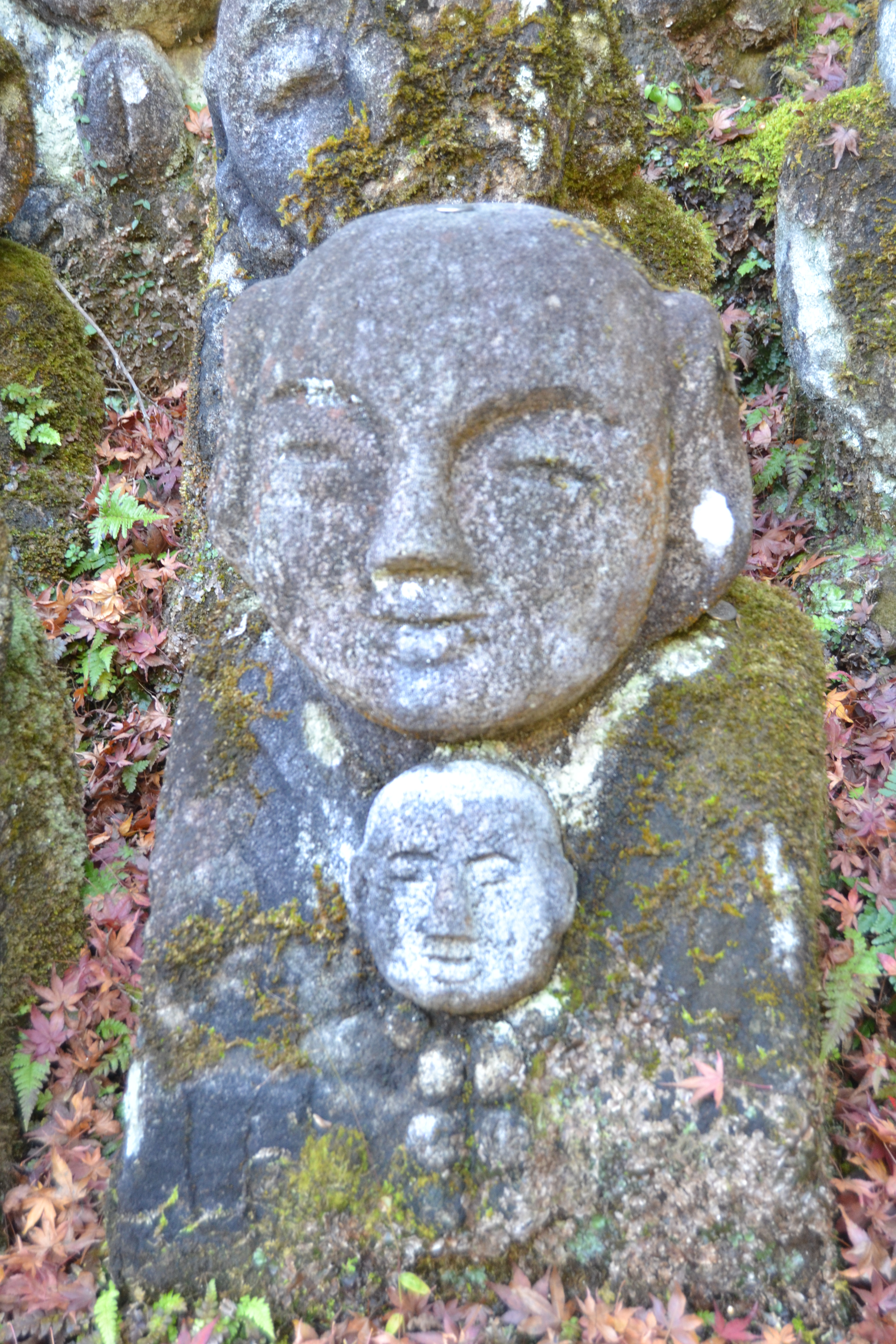 A mother and child rakan statue with an at Otagi Nenbutsuji Temple Photo Credit: AWO staff