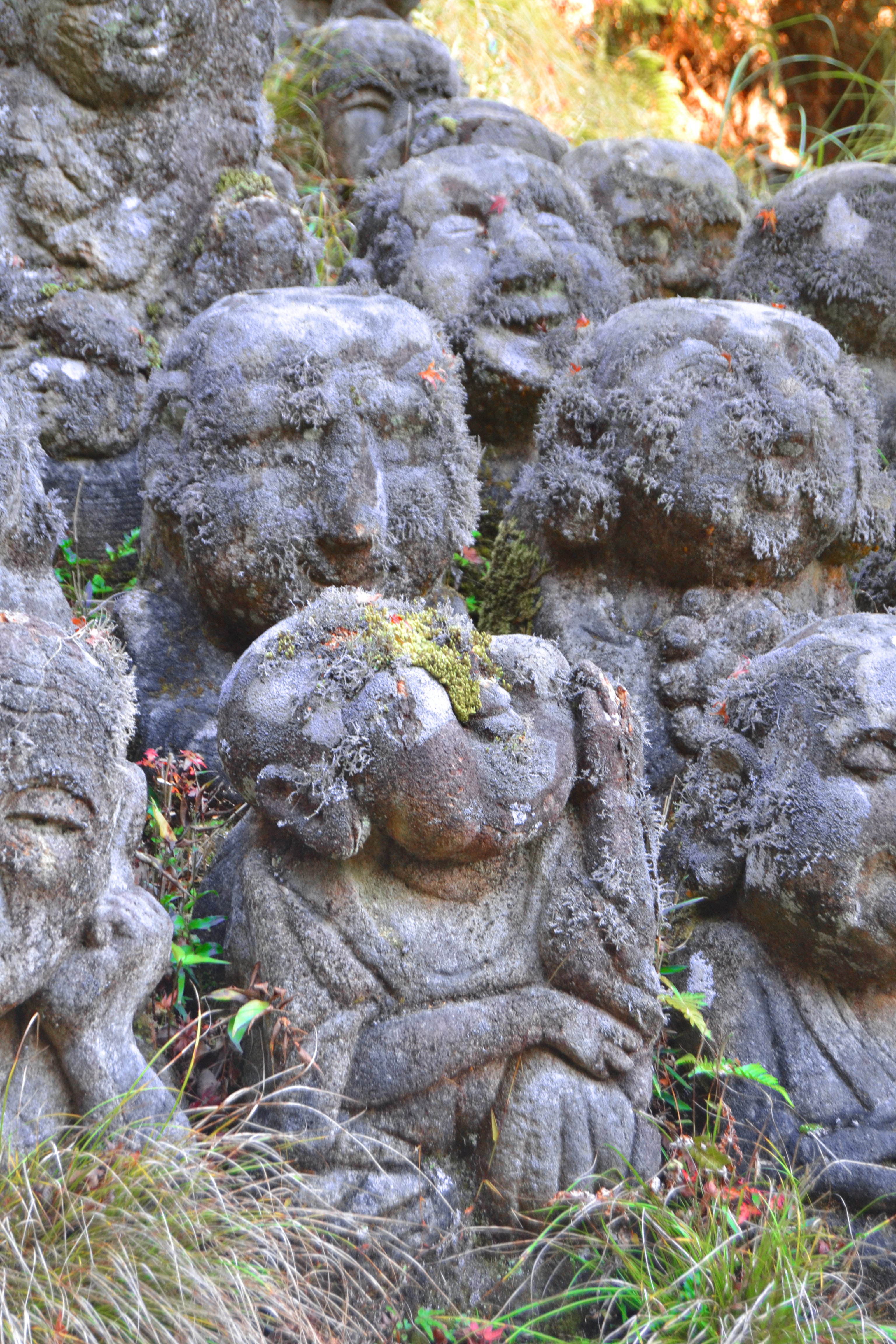 Stone statues with multiple face expressions at Otagi Nensbutsuji Temple Photo Credit: Ameena Navab