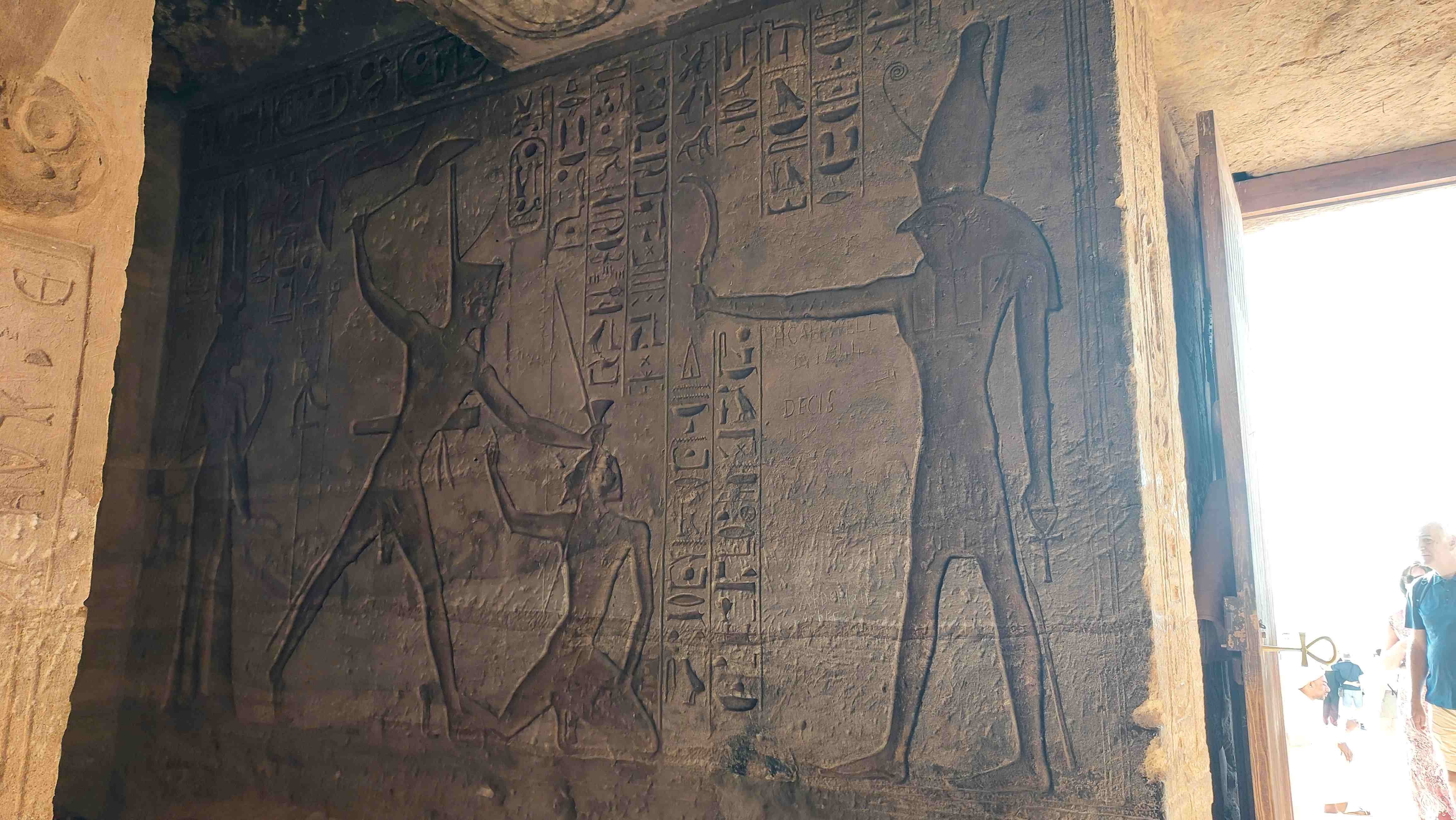 Hieroglyphics inside Nefertari's Temple showing Ramses II in battle with gods Horus and Hathor by his side
