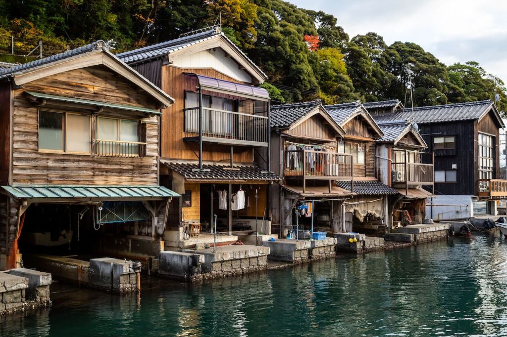 Ine no Funaya - traditional Japanese boat houses in the fishing village of Ine Kyoto Photo Credit: Shutterstock